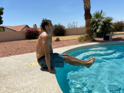 A man doing Hip Lifts in a pool