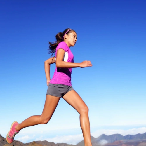 A woman running outside.