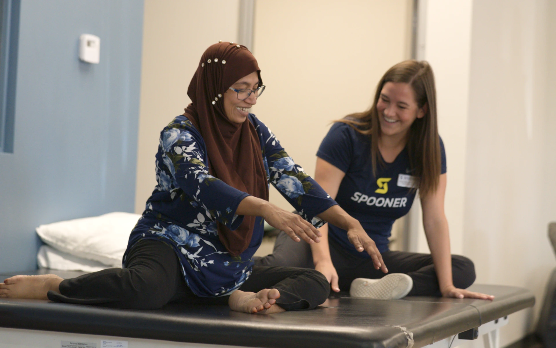 A woman doing pelvic floor exercises with Abby Niemeyer, PT, DPT, FAFS at the Spooner Laveen clinic.